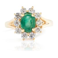 Oval Emerald and Diamond Halo Ring in 14K Yellow Gold