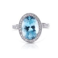 Oval Blue Topaz Diamond Halo Eternity Ring in 18K White Gold and Platinum