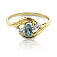 blue-topaz-diamond-bypass-ring-yellow-gold